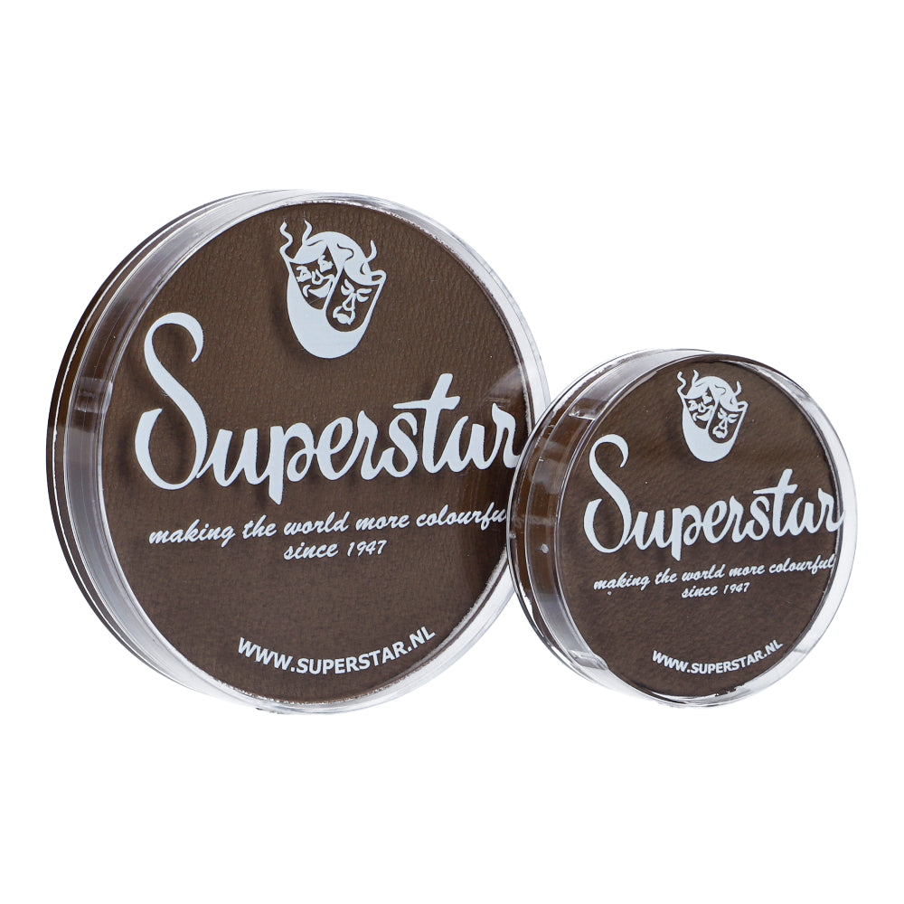 Two circular containers of Infinity Faces Face Paint & Body Paint Aqua Superstar in Chocolate (16g), with a theatrical mask logo. The text says making the world more colourful since 1947 and highlights its water-based formula. Visit us at www.superstar.nl.