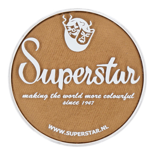 A circular logo with a brown background and white text displays Infinity Faces in large cursive, with making the world more colorful since 1947 beneath. A small mask icon above suggests their cruelty-free Face Paint & Body Paint Aqua Superstar - Camel (45gr). Visit www.superstar.nl at the bottom.