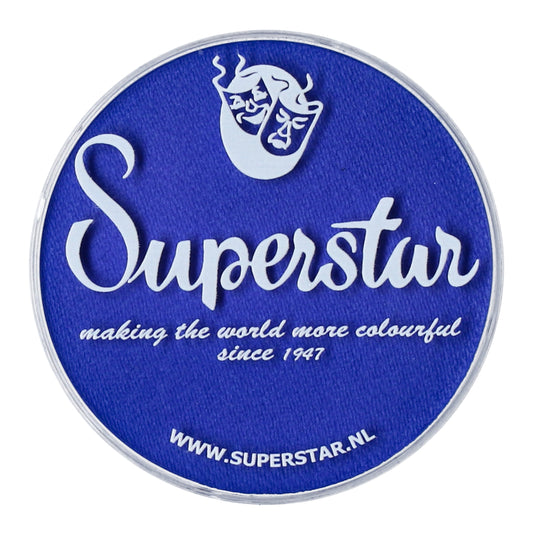 A circular blue logo features Superstar in bold white script. Below it reads, making the world more colourful since 1947. At the top is a white mask-like emblem. Known for cruelty-free Infinity Faces Aqua Superstar face- and bodypaint. Visit www.superstar.nl for more information.
