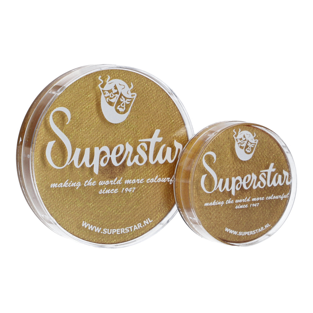 Two round Infinity Faces Aqua Superstar face and body paints in metallic gold shimmer are shown, with the larger 45g container on the left. Both display white text and the brands theatrical mask logo, complying with European Cosmetics Legislation 1223/2009/EC.