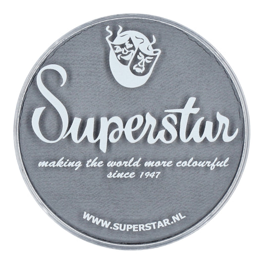 A circular gray patch features Superstar in white cursive. Above it, a flaming mask adds flair, and below it reads making the world more colourful since 1947 with WWW.SUPERSTAR.NL, showcasing Infinity Faces Aqua Superstar Face & Body Paint—light grey, water-based makeup safe for children.