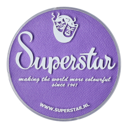 A purple circular label features Superstar in large white letters, with making the world more colourful since 1947 and www.superstar.nl below. A white mask-like design crowns it, showcasing Infinity Faces cruelty-free Face Paint & Body Paint Aqua Superstar - La-laland (16gr) formula.