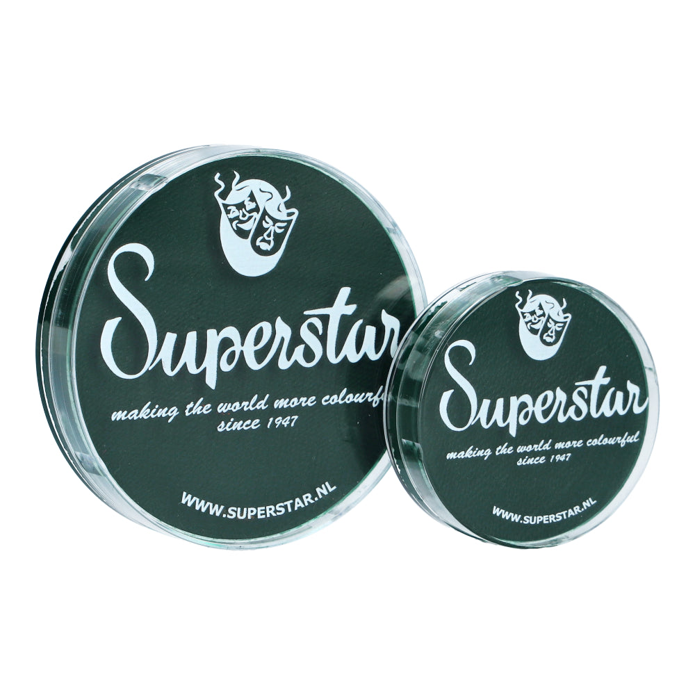 Two round containers of Infinity Faces Aqua Superstar Face & Body Paint in dark green (16gr) feature a mask logo on a black background with white text. Renowned since 1947 for vibrant water-based makeup, this product showcases the timeless quality and colorfulness of their offerings.