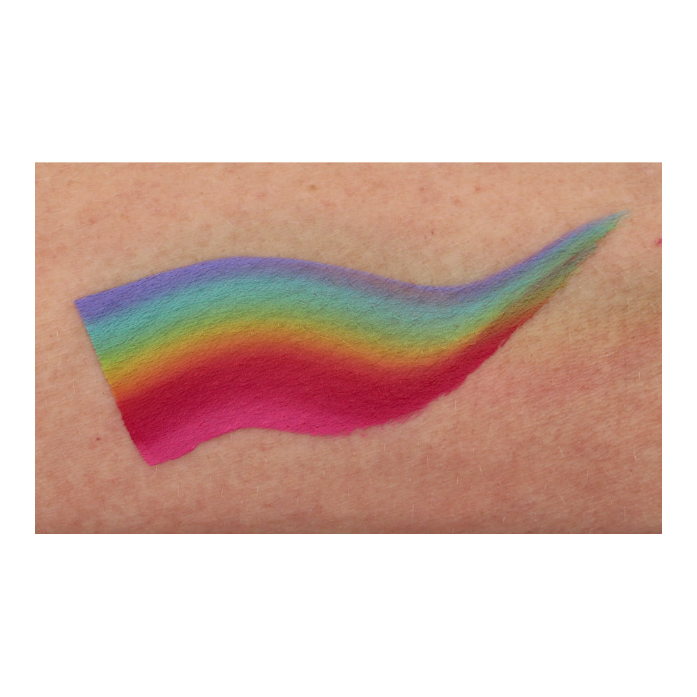 Using Infinity Faces Aqua Superstar Face & Body Paint in Little Rainbow (One Stroke) 30gr, a vibrant wave-like rainbow pattern is created on skin, transitioning smoothly from red to violet, ensuring cruelty-free beauty on a light skin tone.