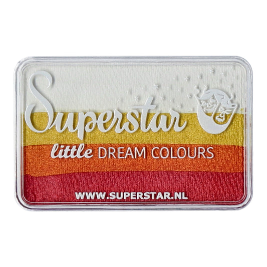 A rectangular plastic case features Infinity Faces’ Face Paint & Body Paint Aqua Superstar - Little Magic Sunrise, showcasing water-based makeup with horizontal stripes of white, yellow, orange, and red. This cruelty-free product is highlighted on www.superstar.nl.
