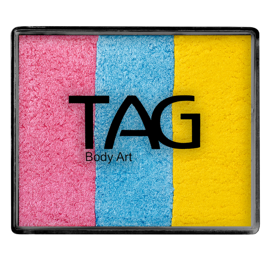 The Infinityfaces Face Paint & Body Paint Aqua - Jewel Split Cake (50g) features three bold vertical stripes—pink, blue, and yellow—and is perfect for creative looks with easy application. TAG Body Art is printed across the palette’s center.