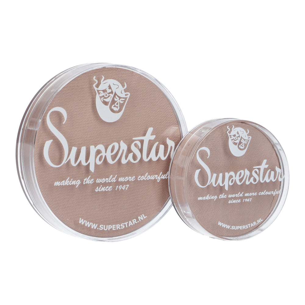 Two round containers of Infinity Faces’ Face Paint & Body Paint Aqua Superstar - Shock complexion (16gr) have transparent lids with a theatrical mask logo and the text making the world more colourful since 1947. The cruelty-free, water-based makeup is set against a white background.