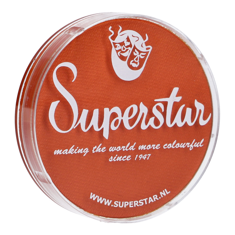 Round container with an orange lid featuring Face Paint & Body Paint Aqua Superstar - Dark Orange, a theater mask, and making the world more colorful since 1947. This cruelty-free, water-based makeup by Infinity Faces is at www.superstar.nl.