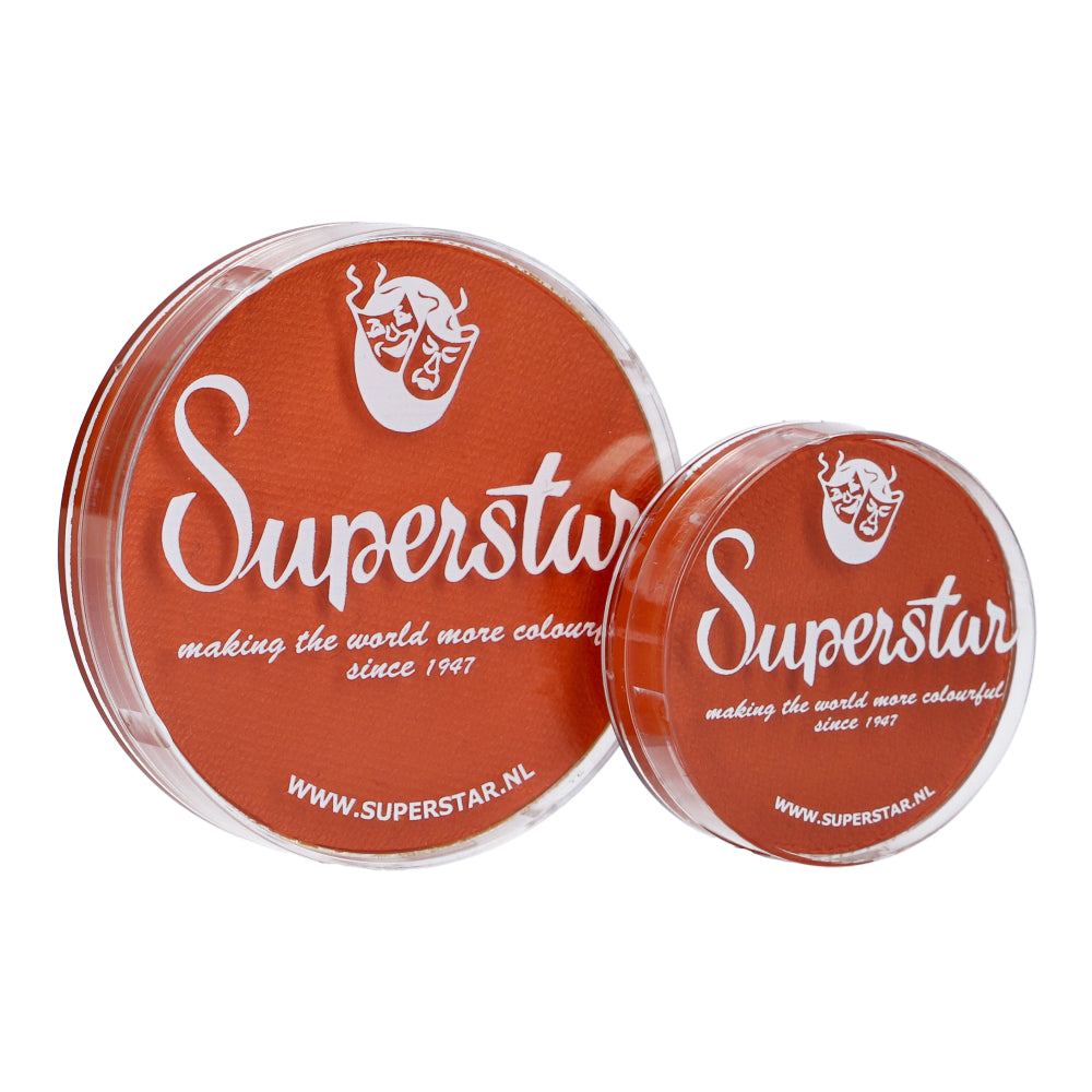 Two round Infinity Faces containers of Face Paint & Body Paint Aqua Superstar - Dark Orange (16gr), one large and one small, have orange lids with white text and a mask logo. The text reads, Superstar, making the world more colorful since 1947, along with www.superstar.nl. Its water-based and cruelty-free.