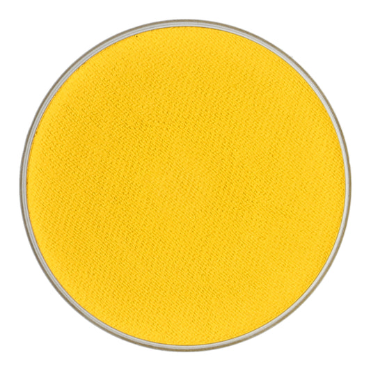 An overhead view shows a round can lid fully coated in bright yellow Aqua Face Paint & Body Paint by Infinity Faces. The cruelty-free, water-based makeup has a slight texture with the metal rim visible at the edges.