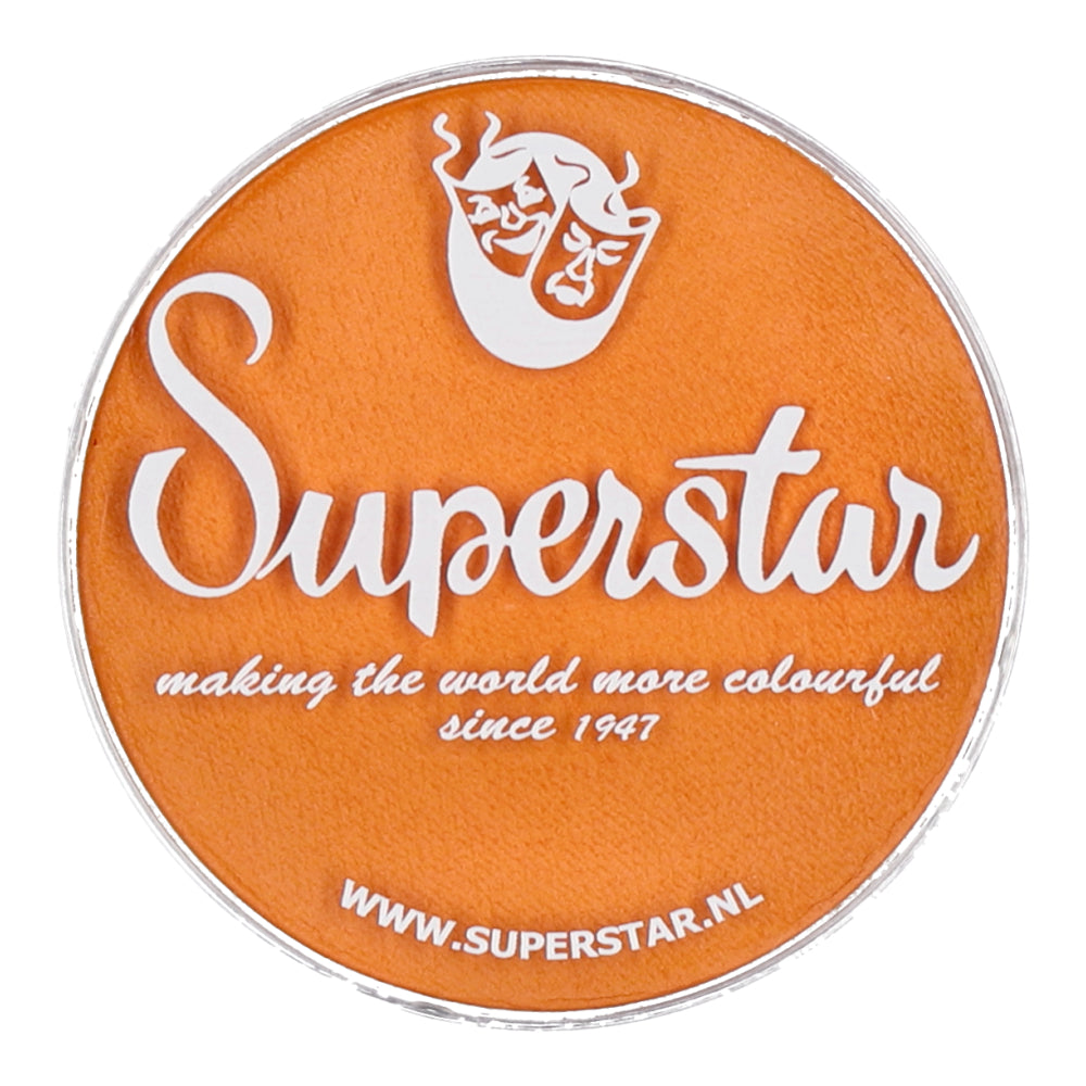 An orange circular container labeled with Superstar, making the world more colourful since 1947 and a theater mask logo. This Aqua Superstar Face- and Bodypaint, by Infinity Faces, uses water-based makeup that complies with European Cosmetics Legislation. Visit www.superstar.nl for more info.