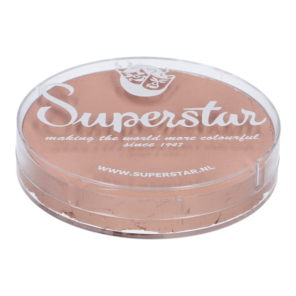 A round, transparent plastic container houses a beige powder with a clear lid reading Face Paint & Body Paint Aqua Superstar - Santa Claus skin complexion by Infinity Faces. It features making the world more colourful since 1947 and highlights its cruelty-free, water-based formula.
