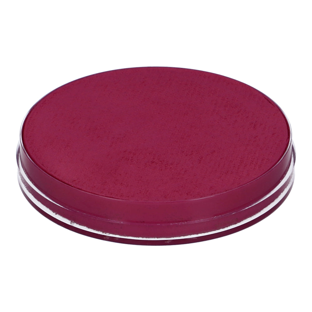 A round, flat maroon object, resembling a compact lid or coaster, sits on a white background. Its surface resembles the vibrant appearance of Infinity Faces’ Aqua Superstar Face & Body Paint - Majestic Magenta (16g), known for its striking water-based colors.
