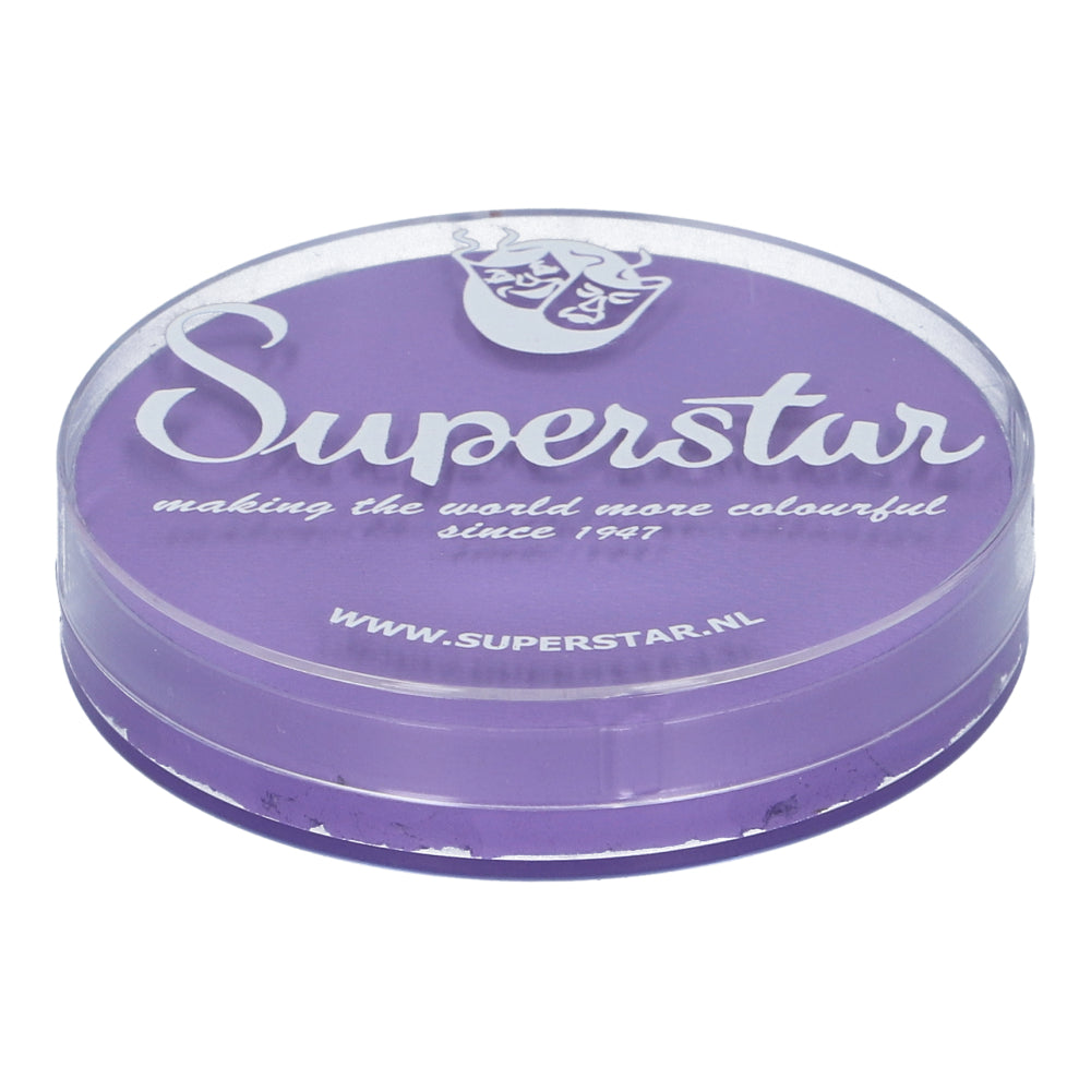 A round container of Infinity Faces La-laland Aqua Face & Body Paint (16g) features vibrant purple, cruelty-free paint and a transparent lid. The lid reads: Superstar, making the world more colourful since 1947, and www.superstar.nl.