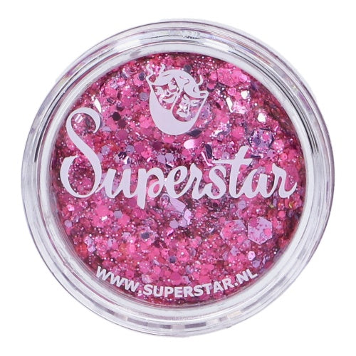 A clear round container of Chunky Glitter Cream Superstar - P!inked (10g) by Infinity Faces, filled with chunky pink glitter. Features a mermaid logo and www.superstar.nl printed on the lid.