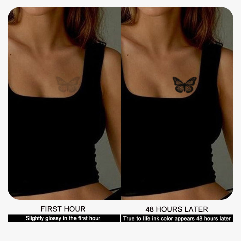 Side-by-side images feature a woman in a black top with an Infinityfaces Temporary Herbal Tattoo - Butterfly on her chest. The left image, labeled First Hour, shows a slightly glossy design, while the right, 48 Hours Later, reveals a richer hue, showcasing color evolution in this skin-safe tattoo.