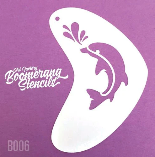 A white Dolphin Boomerang Stencil Body Art by Infinity Faces, featuring a leaping dolphin and water splash cutout, is shown on a purple background with Infinity Faces and Dolphin Boomerang Stencil Body Art in the corner.