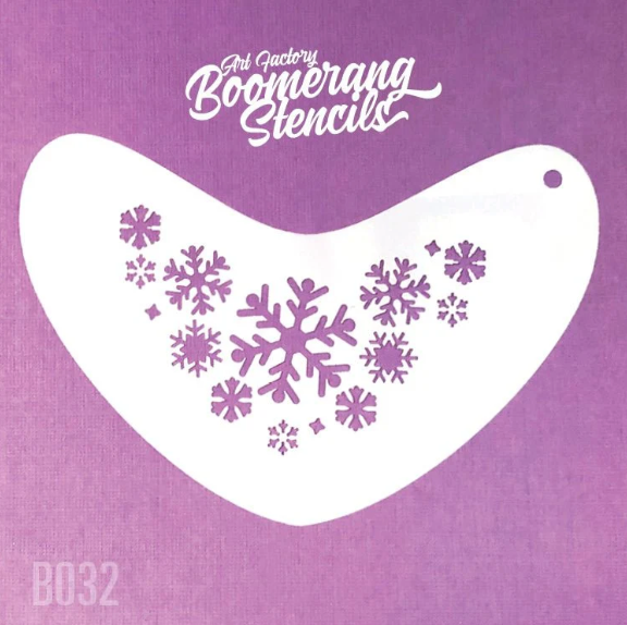The Frozen Snowflakes Boomerang Stencil Body Art by Infinity Faces is a white, curved stencil featuring snowflake cutouts and a hanging hole, shown on a purple background. Boomerang Stencils and B032 appear on the image.