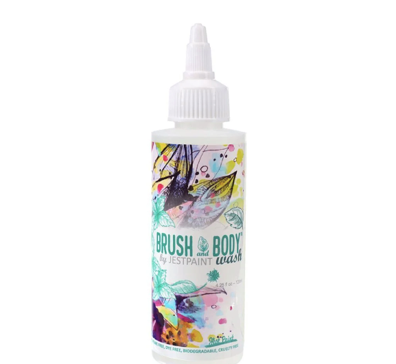 A 50 ml Brush & Body Wash Soap by Infinity Faces features a colorful, artistic floral and abstract label. The reusable bottle includes a pointed spout cap for effortless dispensing, blending style with practicality.