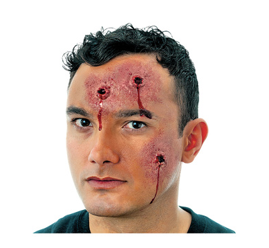 A person with short dark hair uses Infinityfaces Special Effects Prosthetics Woochie Mehron - Body Hits to create the look of three bleeding wounds on their forehead and cheek, set against a plain white background.