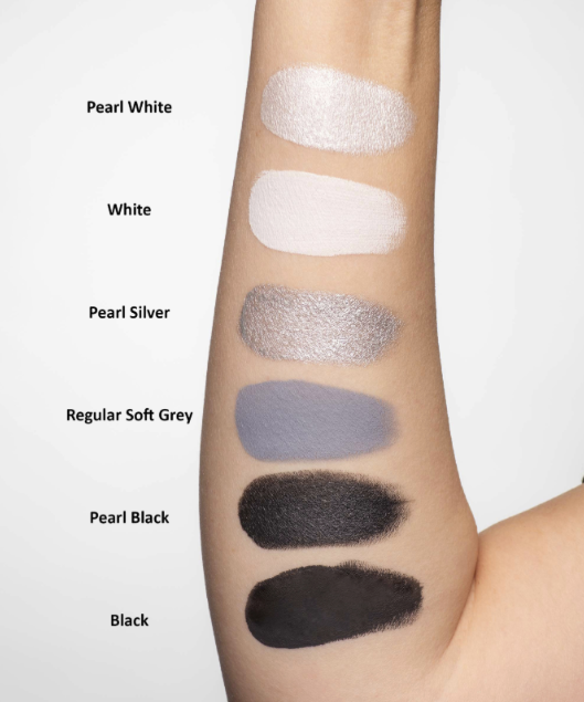A forearm displays six labeled paint swatches from top to bottom: Pearl White, White, Pearl Silver, Regular Soft Grey, Pearl Black, and Black. They are set against a plain white backdrop. Featured product: Infinityfaces Face & Body Paint Aqua Tag - Pearl White (90g).