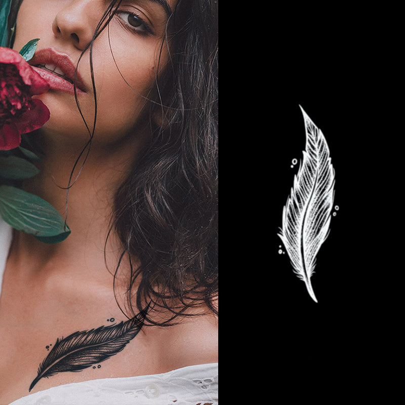 A woman with dark hair showcases the Infinityfaces Temporary Herbal Tattoo - Feather on her collarbone, beautifully complemented by a large pink flower and a white feather illustration in the background.