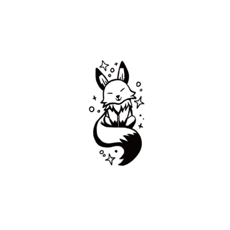 The Temporary Herbal Tattoo - Little Fox by Infinityfaces is a black and white design of a cute, smiling fox sitting with its tail curled. It features whimsical small stars and circles, is plant-based and skin-safe, lasting up to 14 days.