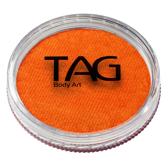 Round container of TAG Face & Body Paint - Pearl Orange (32g).