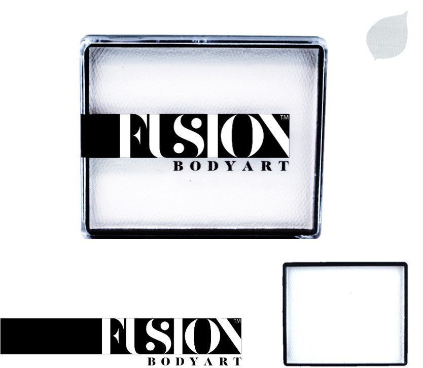 A square container of Infinity Faces Fusion Body Art showcases a sleek black and white palette beneath a clear lid with its bold logo. A gray paint smear graces the upper right corner, while a partial black stripe and logo adorn the bottom left on a minimalist white background.