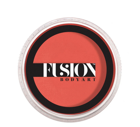 A round container of Infinity Faces Face Paint & Body Paint Aqua Fusion in Prime Coral (32g), featuring a clear lid and a black-and-white brand label across the center.