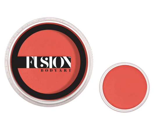 A round 32g container of Infinity Faces Face Paint & Body Paint Aqua Fusion in Prime Coral is shown with the lid on and off, displaying its vibrant coral-red shade against a white background.