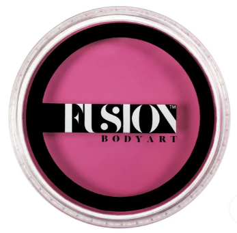 A round 32g container of Infinity Faces Face Paint & Body Paint Aqua Fusion in Prime Pink Temptation, seen from above with a clear lid showcasing the Infinity Faces brand name in bold black and white lettering.