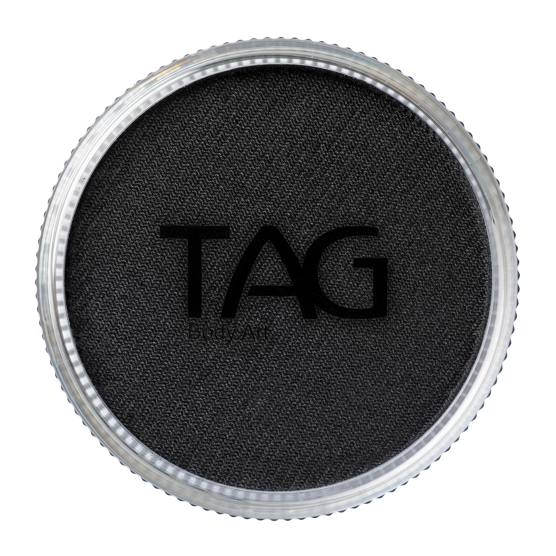 Close-up of a round black textured item, similar to a lid, says TAG at its center. This Face Paint & Body Paint Aqua Tag - Black (90g) by Infinityfaces features a metallic-finished outer edge.