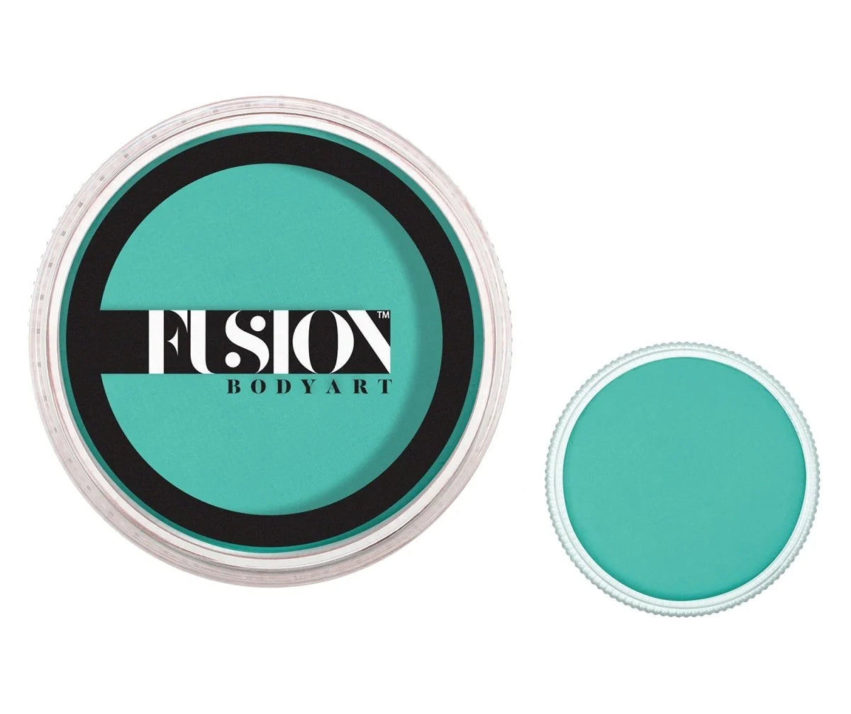 A round container of Fusion Face Paint & Body Paint aqua Fusion - Prime Turquoise Paradise (32g), shown both with its lid and as a standalone turquoise paint disc.