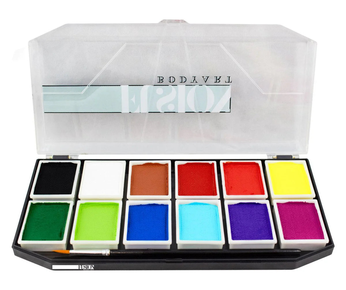 An open Infinityfaces Starter Kit displays twelve rectangular face paint pans in a variety of vibrant shades. The clear lid is propped open, making it easy to see the professional-quality colors inside.