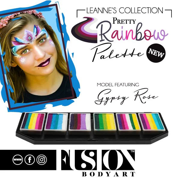 A young woman with bright face paint and purple lipstick poses by the Infinity Faces Entertainment Face Paint & Body Paint Aqua Fusion - Leanne's Pretty Rainbow Palette (6x10g). Model wears Gypsy Rose.