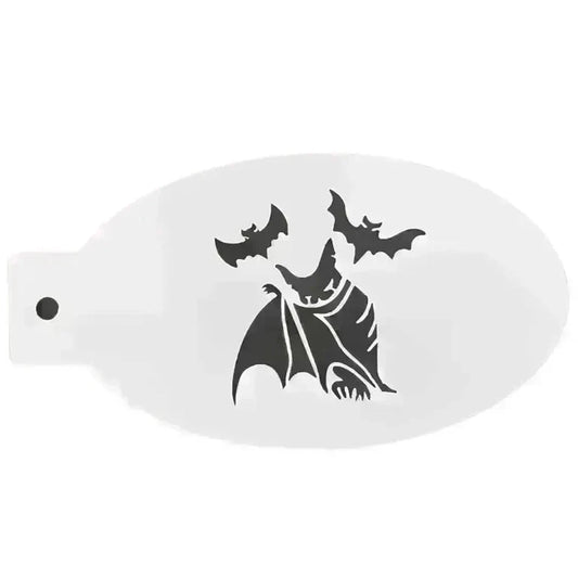 The Vampire Bats The Face Paint Shop Stencil Body Art by Infinity Faces is a white oval stencil with a black-cut bat-winged creature and two flying bats above it.